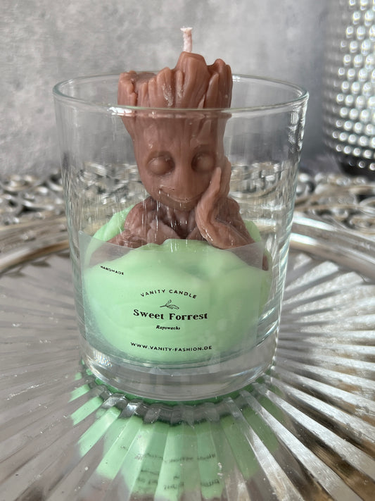 Süsse kleiner Baumstamm Kerze